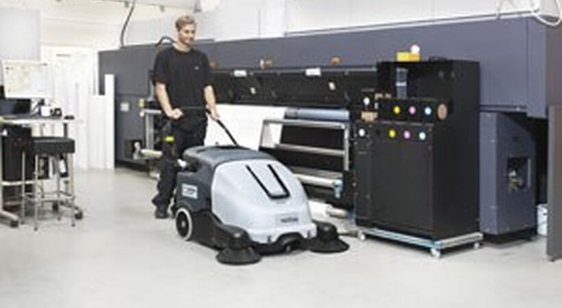 Walk behind sweeper designed to increase productivity